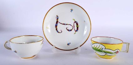 AN 18TH CENTURY GERMAN MEISSEN PORCELAIN CUP AND SAUCER together with another Meissen cup. Largest