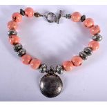 A Tribal Necklace with Coral Beads. Length 48cm, Bead Size 22.2mm