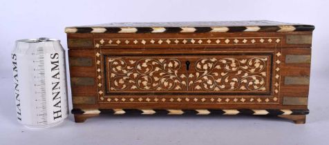 A LARGE 19TH CENTURY ANGLO INDIAN BONE INLAID HARDWOOD BOX decorative all over with scrolling