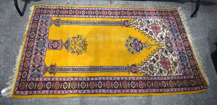 A Persian rug 188 x 117 cm.