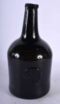 AN 18TH CENTURY ENGLISH WINE BOTTLE bearing seal mark to front T Shortland 1772. 22 cm high.