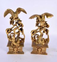 A RARE PAIR OF EARLY 19TH CENTURY EUROPEAN ORMOLU FIGURAL GROUPS depicting vultures overlooking