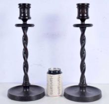 A pair of 1920's wooden barley twist candlesticks 39 (2).