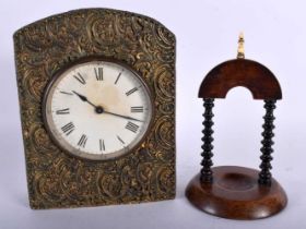 AN EARLY VICTORIAN WALNUT POCKET WATCH HOLDER together with a gilt metal clock. Largest 18 cm x 13