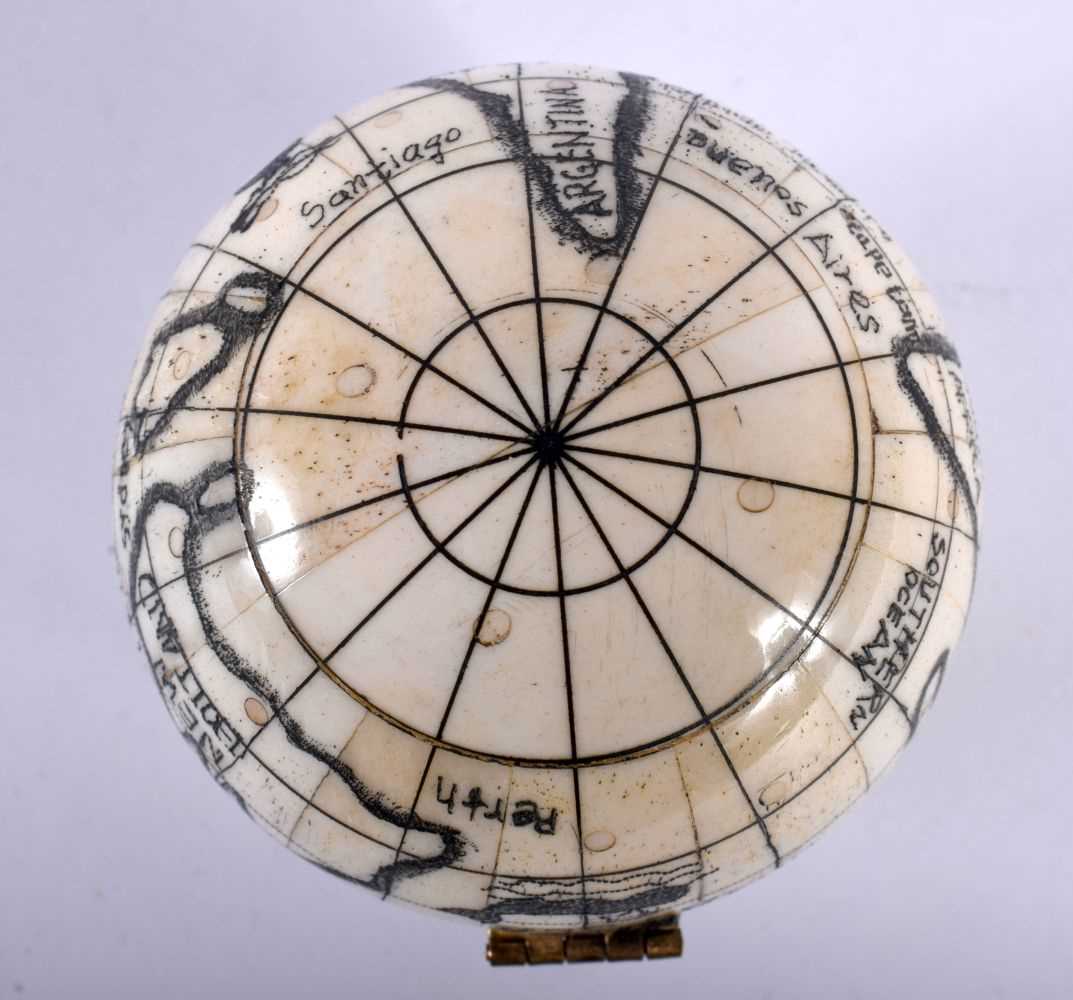 A Bone Globe with a Compass insert. 7cm x 7cm x 7cm - Image 5 of 5