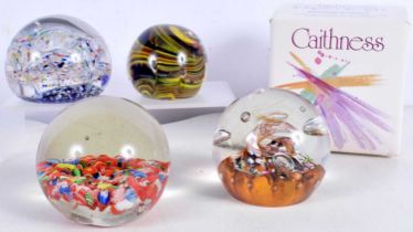 A boxed Caithness paperweight, together with 3 other paperweights