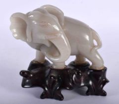 A LATE 19TH CENTURY CHINESE CARVED JADE FIGURE OF AN ELEPHANT Qing. 10.5 cm x 10.5 cm.