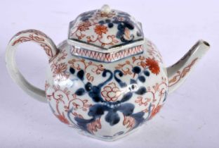 AN EARLY 18TH CENTURY JAPANESE EDO PERIOD IMARI TEAPOT AND COVER painted with flowers. 13 cm wide.