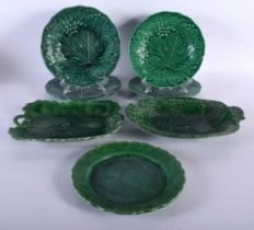 A COLLECTION OF SEVEN VARIOUS 19TH CENTURY ENGLISH GREEN CABBAGE WARE TYPE WAES. Largest 23 cm wide.