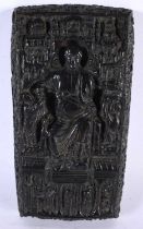 A 17TH/18TH CENTURY EUROPEAN BRONZE PANEL OF A FEMALE SAINT modelled amongst other figures and