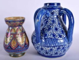 A SMALL ANTIQUE HISPANO MORESQUE TYPE LUSTRE VASE together with a delft faience four handled vase.