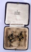 A PAIR OF LATE VICTORIAN YELLOW METAL AND CITRINE EARRINGS. 16.1 grams. 5.5 cm x 2.5 cm.