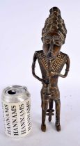 A LARGE 19TH CENTURY AFRICAN TRIBAL BRONZE FIGURE OF A WOLF MUSICIAN modelled playing a pipe. 30cm