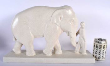 AN ART DECO FRENCH STEF POTTERY FIGURAL GROUP OF MAHOOT AND THE ELEPHANT. 48 cm x 32 cm.