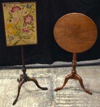 A GEORGE III MAHOGANY TILT TOP TABLE together with a Victorian fire screen. Largest 150 cm high. (