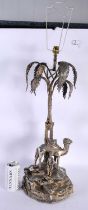 A VERY LARGE 19TH CENTURY ENGLISH SILVER PLATED TABLE LAMP formed as an Eastern male beside a camel,