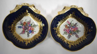 18th century Worcester fine pair of shell dishes painted with flowers surrounded by elaborate
