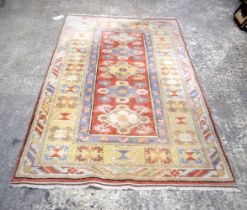 A Turkish Wool rug 198 x 122 cm.