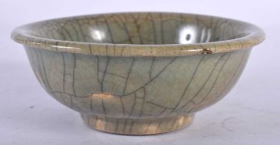 A CHINESE QING DYNASTY GE TYPE STONEWARE BOWL of plain form. 12.5 cm diameter.