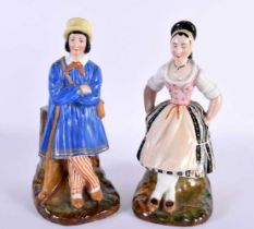 A PAIR OF 19TH CENTURY RUSSIAN FRENCH PORCELAIN FIGURAL GROUPS depicting a male and female upon a