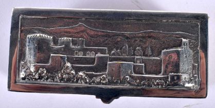 An Embossed Lidded White Metal Box. The Lid depicting a Castle in a Landscape. 8cm x 3.6cm x 1.