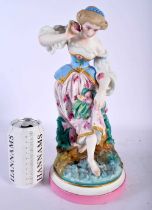 A LARGE 19TH CENTURY FRENCH BISQUE PORCELAIN FIGURE OF A FEMALE modelled holding shells beside a