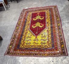 An Anatolian prayer rug 230 x 142 cm.