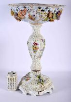A LARGE EARLY 20TH CENTURY GERMAN PORCELAIN ENCRUSTED COMPORT painted with flowers. 53 cm x 23 cm.