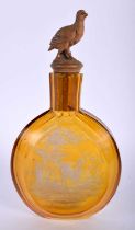 A 19TH CENTURY BOHEMIAN AMBER GLASS HUNTING FLASK with Bavarian black forest carved wood stopper. 18