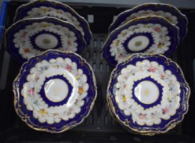 A LARGE MID 19TH CENTURY ENGLISH PORCELAIN DESSERT SERVICE painted with flowers, pattern 3646.