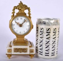 A CHARMING EARLY 19TH CENTURY FRENCH ORMOLU AND WHITE MARBLE MANTEL CLOCK of small proportions. 17