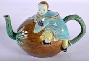 AN UNUSUAL 19TH CENTURY CONTINENTAL MAJOLICA TEAPOT AND COVER in the manner of Minton, formed as a