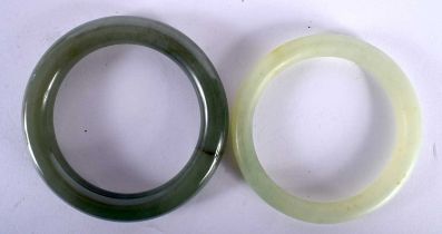 Two Jade Bangles. Largest 6cm internal, total weight 110g (2)
