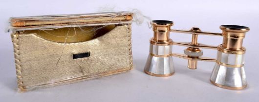A CASED PAIR OF MOTHER OF PEARL OPERA GLASSES. 9.5 cm x 6 cm.