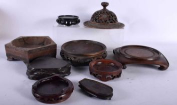 A LARGE 19TH CENTURY CHINESE HARDWOOD RETICULATED LID Qing, together with other hardwood stands.