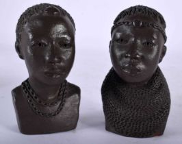 A PAIR OF AFRICAN OJUANG POTTERY BUSTS OF TRIBAL PEOPLE. 10 cm x 4.5 cm.