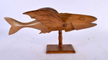 A PITCAIRN ISLANDS FIGURE OF A FLYING FISH Sam Young. 37 cm wide.