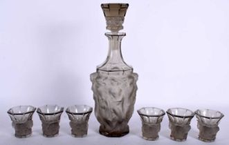 AN ART DECO CZECH SMOKEY GLASS DECANTER AND STOPPER with six matching glasses. Largest 28 cm