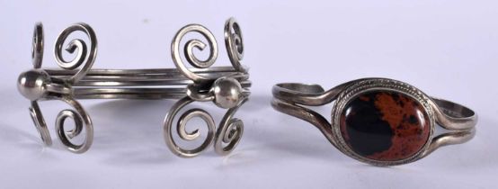 TWO SILVER BANGLES. 76.6 grams. 6.25 cm wide. (2)