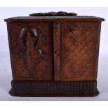 AN ANTIQUE BAVARIAN BLACK FOREST CARVED WOOD SMOKERS PIPE BOX. 21 cm x 18 cm.