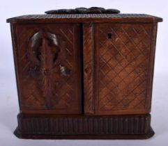 AN ANTIQUE BAVARIAN BLACK FOREST CARVED WOOD SMOKERS PIPE BOX. 21 cm x 18 cm.