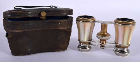 An Antique Pair of Mother of Pearl Opera Glasses. 10cm x 4cm
