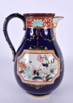 A RARE ANTIQUE MASONS IRONSTONE HOT WATER JUG printed and painted with flowers upon a rich blue