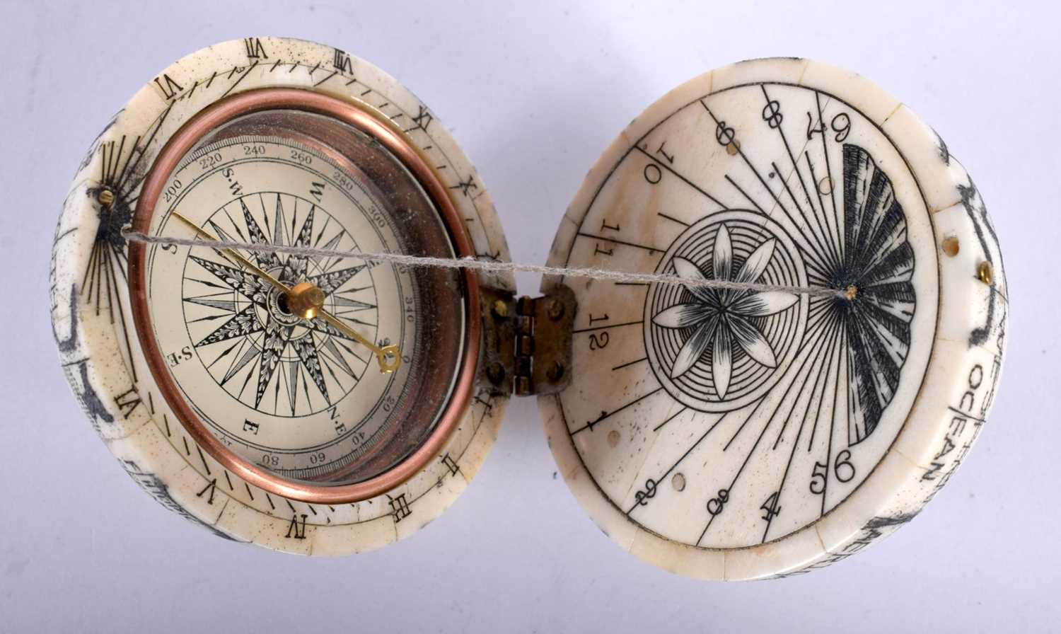 A Bone Globe with a Compass insert. 7cm x 7cm x 7cm - Image 3 of 5
