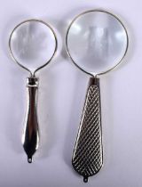 TWO SILVER PLATED MAGNIFYING GLASSES. Largest 11 cm x 3.25 cm. (2)