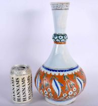 A LARGE TURKISH IZNIK VASE painted with flowers. 31 cm high.