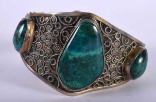A Continental Silver and Malachite Bangle. Stamped Israel Sterling Silver, Internal 6.5cm x 5.6cm,
