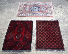 A Afghan prayer rug together with two other prayer rugs, largest 80 x 54cm.(3)
