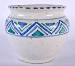 AN ART DECO ENGLISH POTTERY JAR possibly Early Poole. 10 cm x 10 cm.