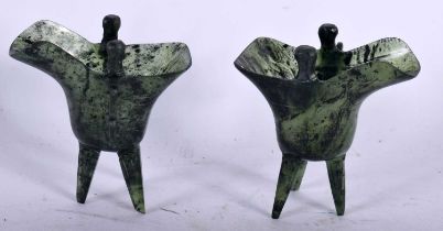A PAIR OF EARLY 20TH CENTURY CHINESE SERPENTINE JADE JUE WINE VESSELS Late Qing/Republic. 8 cm x 6